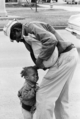 African American Man with Crying Child, 1962 by McMahan Photo Archive